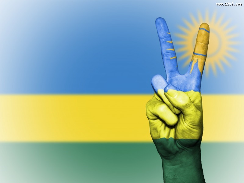 国旗背景的胜利手势图片