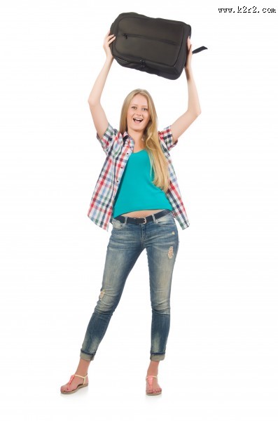 手拿旅行箱的美女图片大全