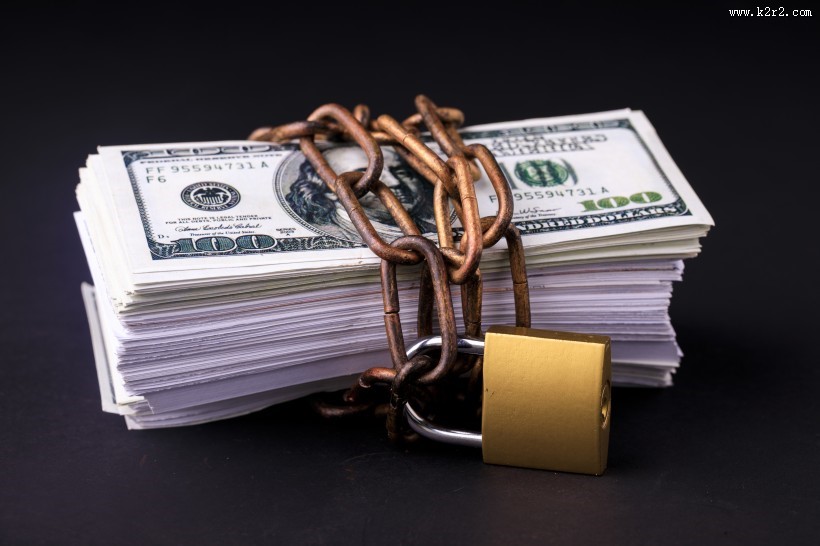 钱币与锁寓意资产与安全图片大全