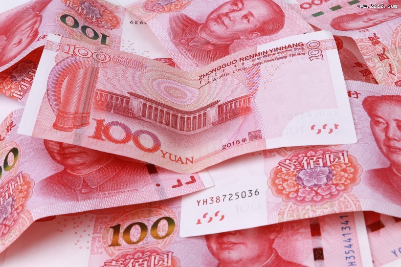 红色流通的人民币图片