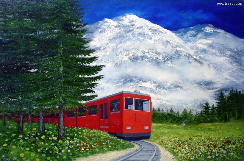 穿过秀丽风景的观光火车图片