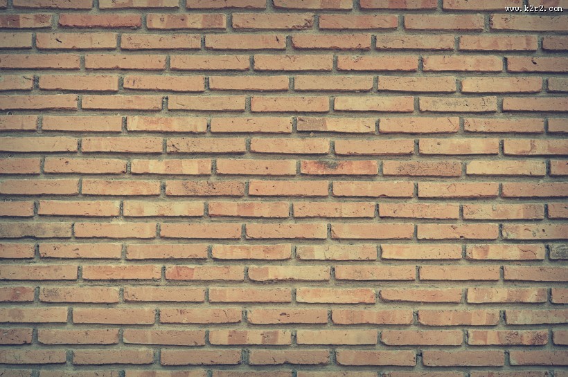由砖和水泥建成的墙图片