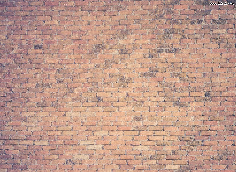 由砖和水泥建成的墙图片