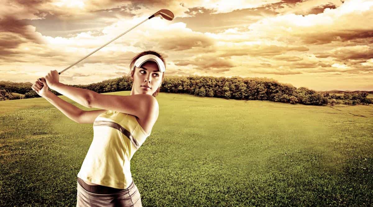 草地美女高尔夫球运动图片