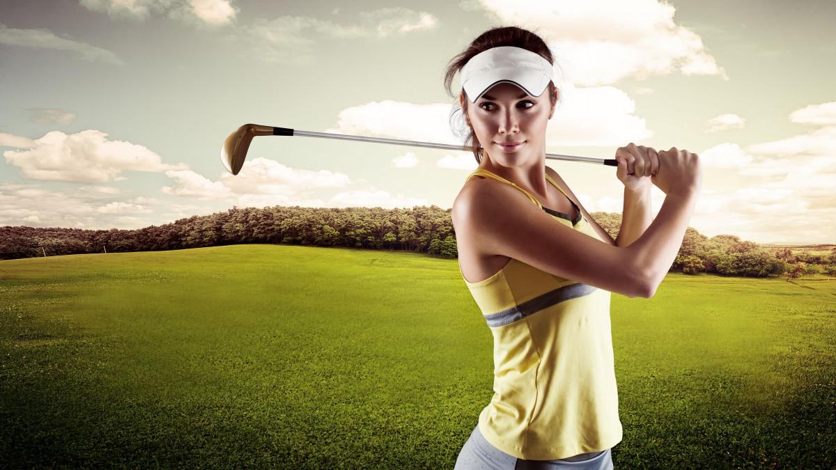 草地美女高尔夫球运动图片