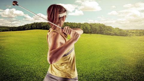 草地美女高尔夫球运动图片